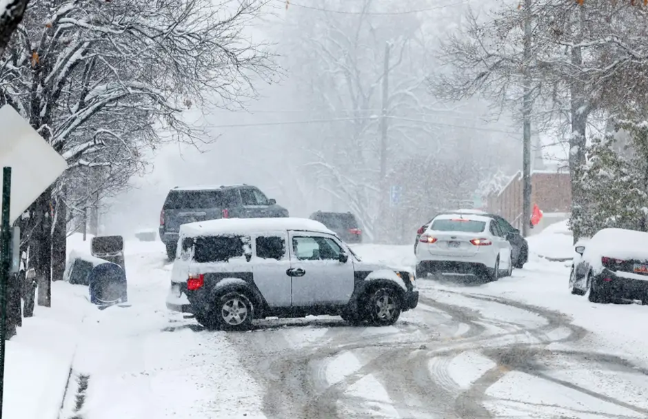 Vehicles struggle to negotiate roads in Salt Lake City