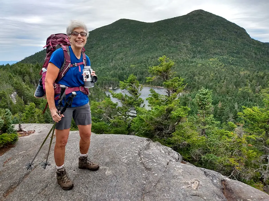 A tourist hiking at the Appalachian Trails in Maine